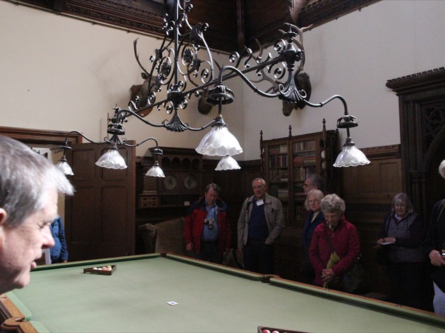 Tyntesfield - Group members inspect the heated billiard table