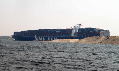 Container ship on the Suez Canal at Lake Timsah Copyright Bill Barksfield 2010